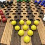 Marble Solitaire And Chinese Checkers